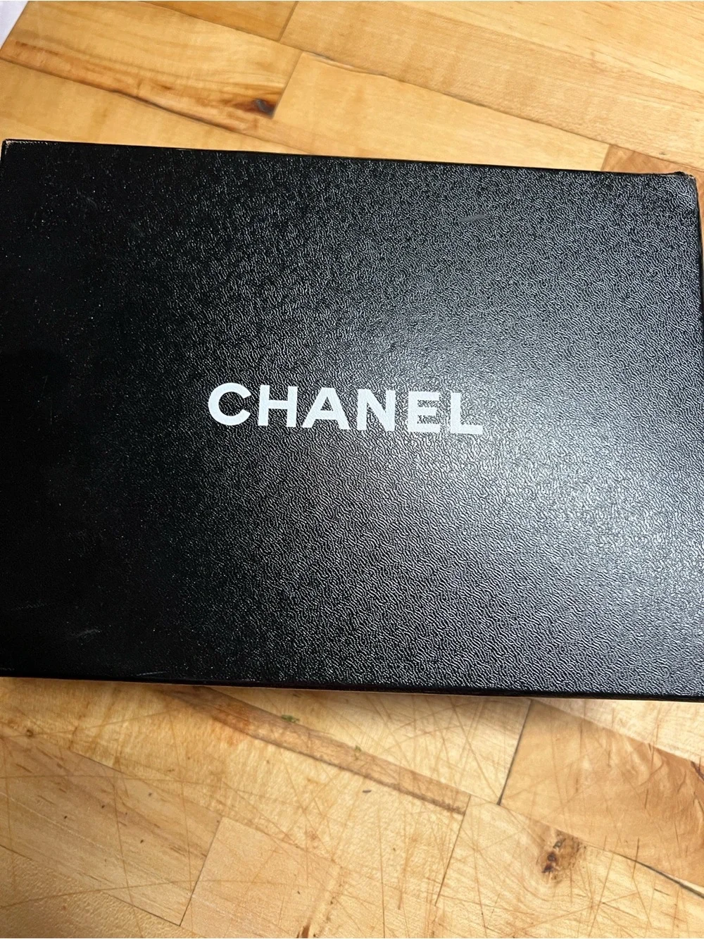 CHANEL About Pearls Black Quilted Pearl-Embellished Mini Lambskin Bucket Bag